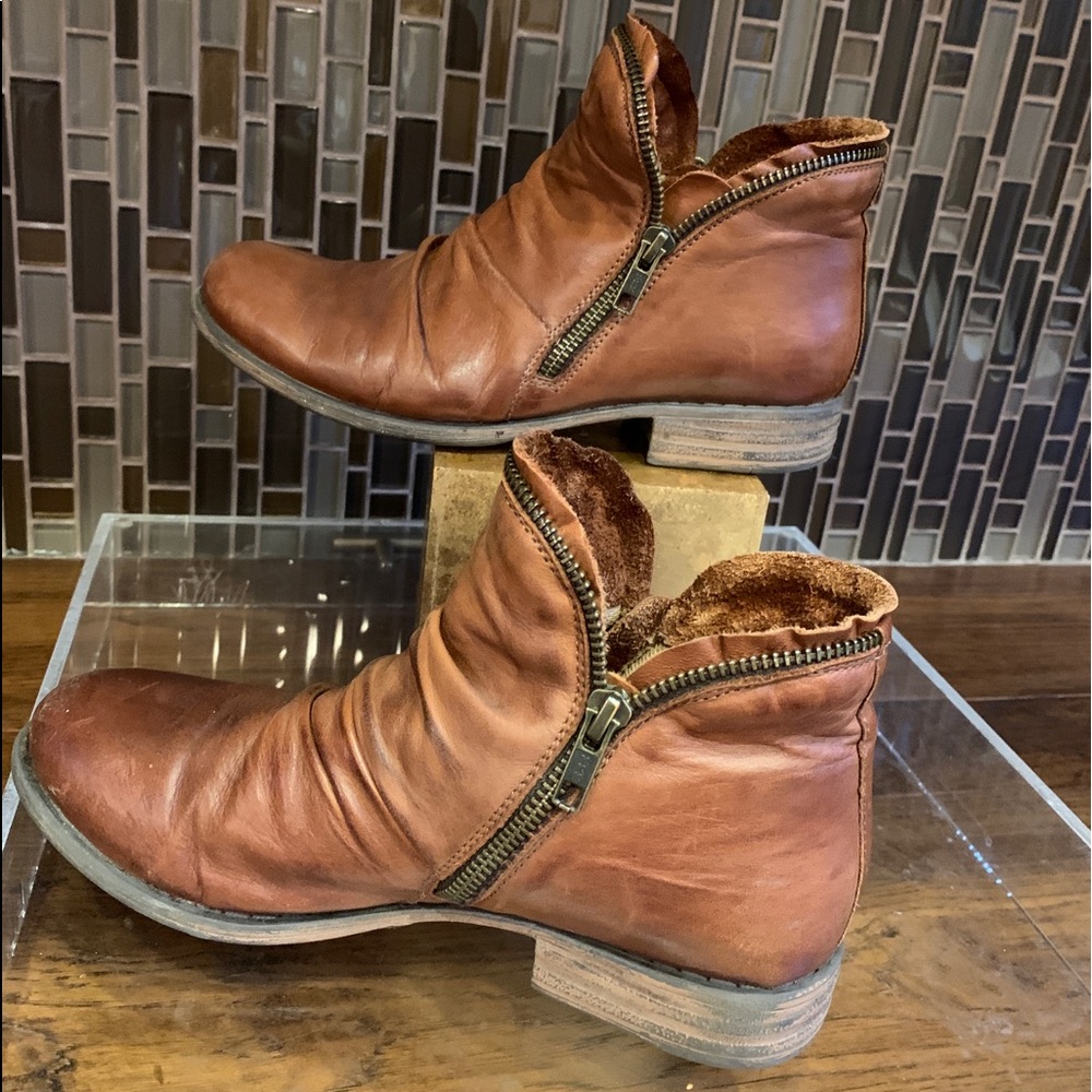 Miz Mooz Luna Leather Ankle Bootie.  Fits like 7. Most comfortable booties ever!